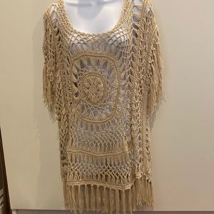 M Questions designer. Completely crochet design with a stretchy comfort feel
